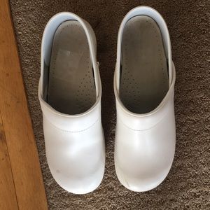 Women’s dansko nursing clogs.
